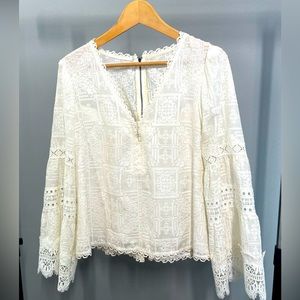 Nanette Lepore plunge neckline blouse.